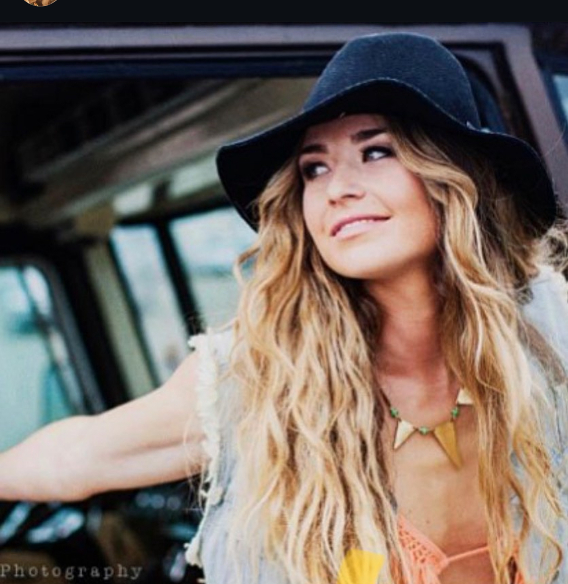 Golden-hour portrait in wide-brim hat