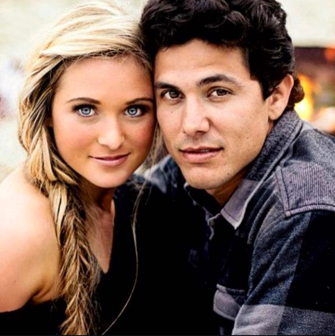 Intimate couple portrait by firelight